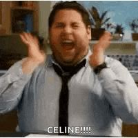 a man in a blue shirt and tie is screaming in a kitchen .