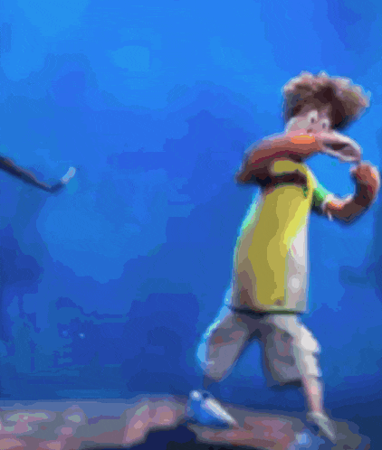 a boy with a prosthetic leg is walking on a stage