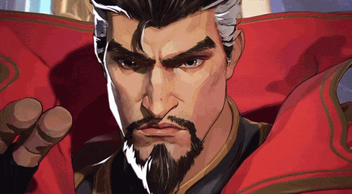 a close up of a man with a beard wearing a red cloak
