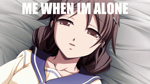a girl is laying on a bed with the words me when i 'm alone above her