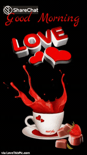 a cup of coffee with a splash of red liquid and the words good morning