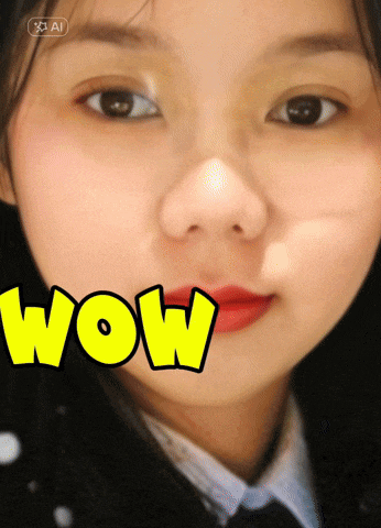 a close up of a woman 's face with the word wow in yellow letters
