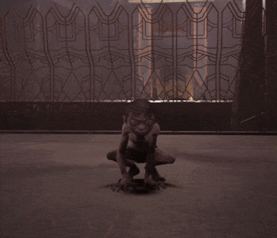 a statue of a gorilla crawling on the floor