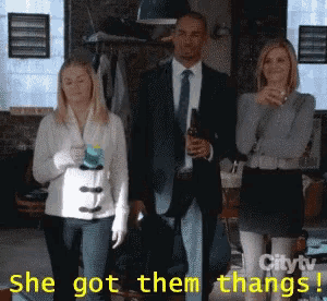 a group of people standing next to each other with the words she got them thangs above them