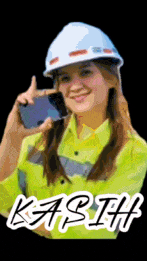 a woman wearing a hard hat and safety vest is holding a cell phone and the name kasih is on the bottom