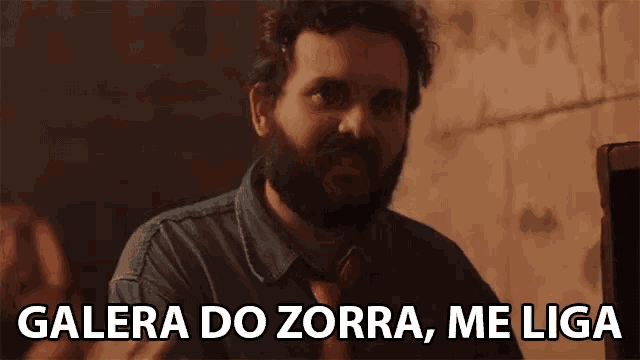 a man with a beard and tie says galera do zorra