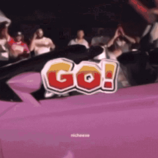 a purple car with the words go on it
