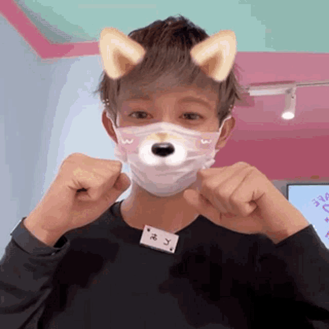 a man wearing a mask with a dog face and ears