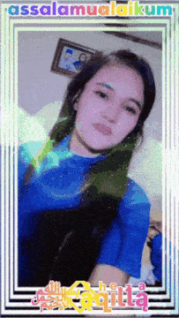 a picture of a woman in a blue shirt with the words assalamualaikum on it