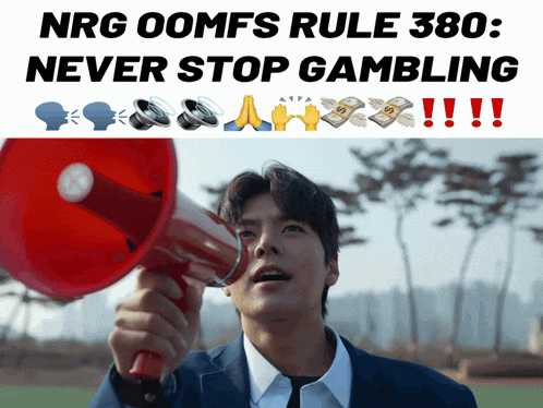 a man is holding a megaphone in front of a sign that says nrg oomfs rule 380 never stop gambling !!!