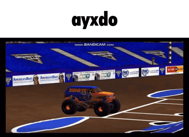 a monster truck on a race track with ayxdo in the upper right corner