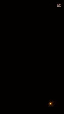a man in a black shirt with a neon sign that says " gadg "