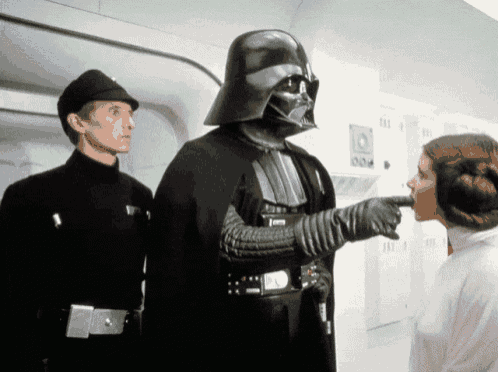 darth vader is pointing at princess leia