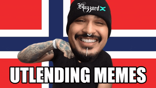 a man wearing a beanie that says blazord on it