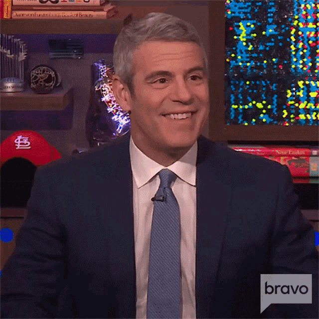 a man in a suit and tie is on bravo television
