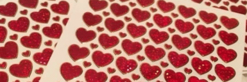 a bunch of red hearts on a white background