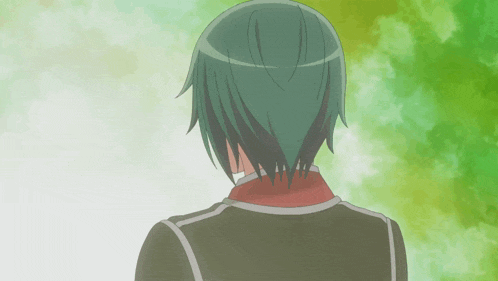 a man with green hair and a red collar