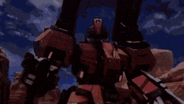 a red robot with two cannons on it 's arms