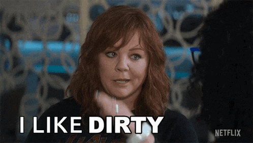 a woman says i like dirty while holding a light bulb