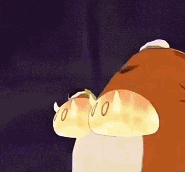 a close up of a cartoon character with a bunch of bread on its face .