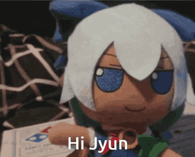 a stuffed animal says hi jyun on it