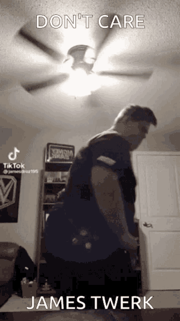 a man is doing a james twerk dance in a living room