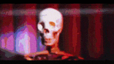 a pixelated image of a skeleton with a red curtain behind it