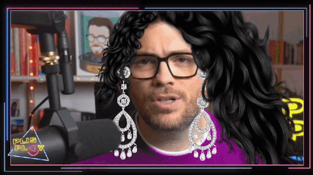 a man is wearing a wig and earrings with the words plus play in the corner