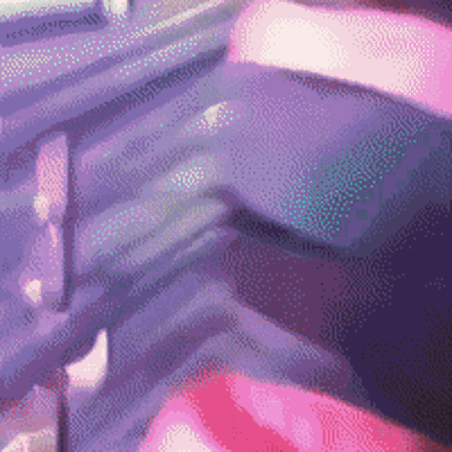 a pixelated image of a person sitting in a chair with a purple background