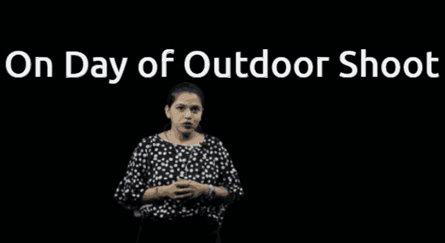 a woman stands in front of a black background with the words on day of outdoor shoot