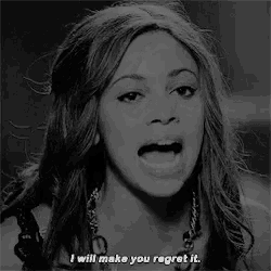 a black and white photo of a woman with her mouth open and the words i will make you regret it