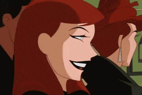 a close up of a cartoon character with red hair and blue eyes