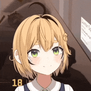 a girl with short blonde hair and green eyes is smiling in front of a sign that says quantum sq