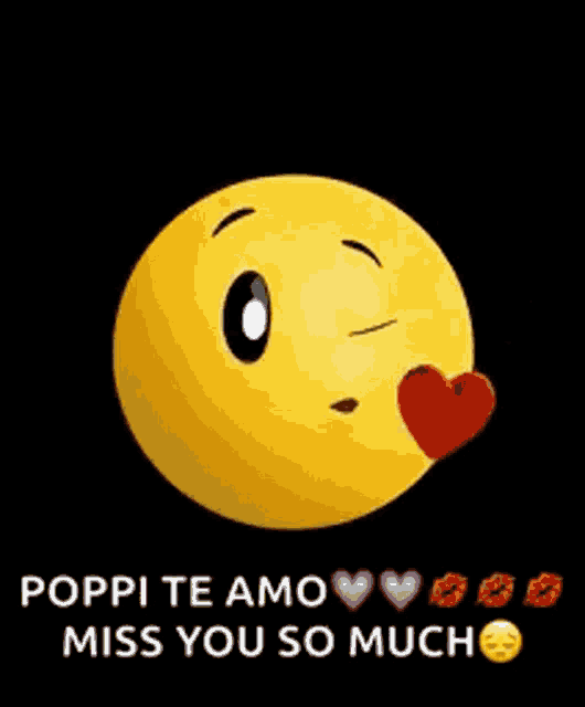 a yellow smiley face is blowing a kiss with a heart on its nose .