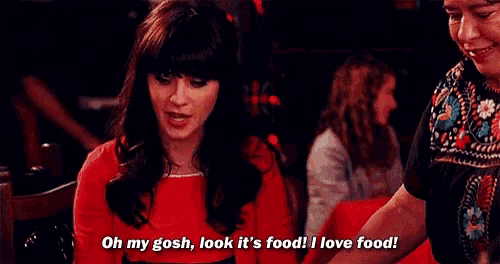 a woman in a red dress says " oh my gosh look it 's food i love food "