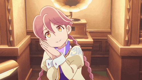 a girl with a braided ponytail is sitting in front of a phonograph