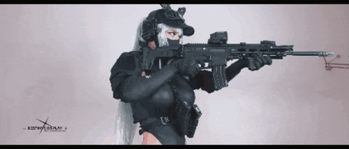a woman holding a gun with the word cosplay on the bottom right corner