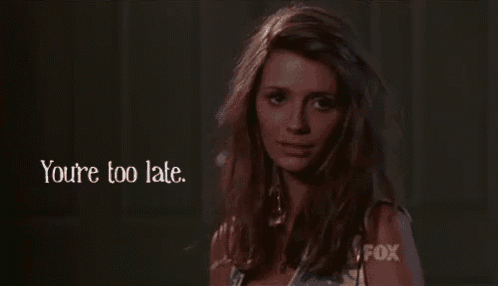 a woman says you 're too late in front of a fox sign