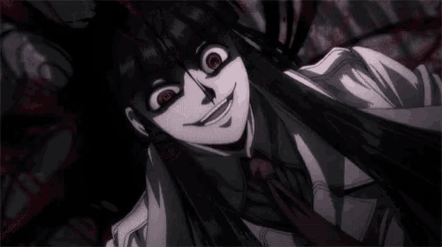 a black and white cartoon character with red eyes is smiling