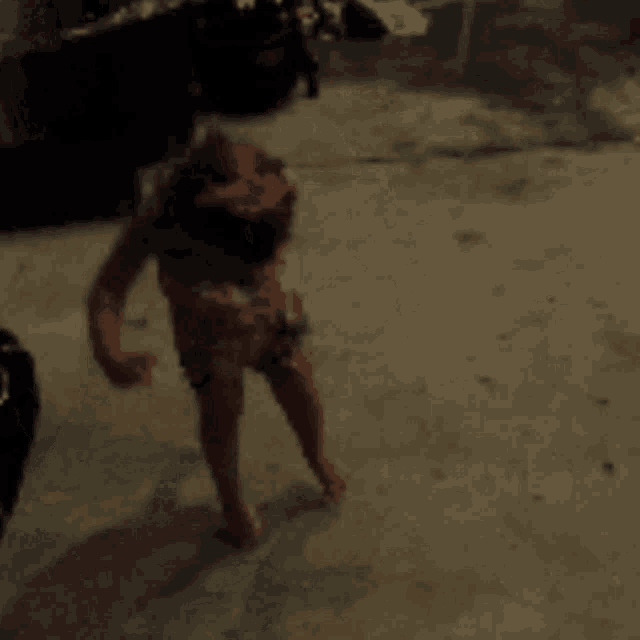 a little girl in a dress is standing in a room