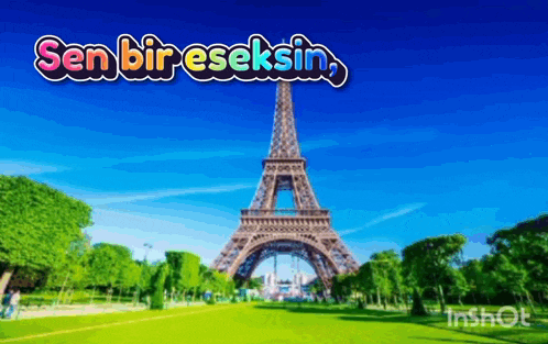 a picture of the eiffel tower with the words sen bir eseksin written above it