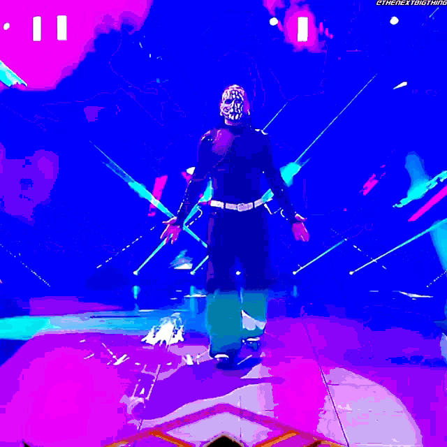 a man is walking on a stage with the words hell in a cell in the background