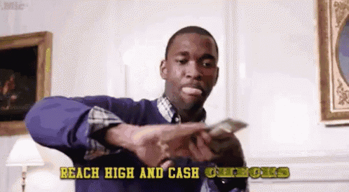 a man is holding a bunch of money in his hands with the words reach high and cash checks below him