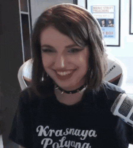 a woman wearing a t-shirt that says krasnaya polyana