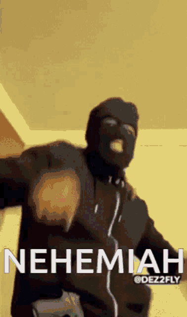 a man in a ski mask is holding a gun and the word nehemiah is on the screen