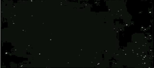 a black and white photo of a ring of light coming out of the earth .
