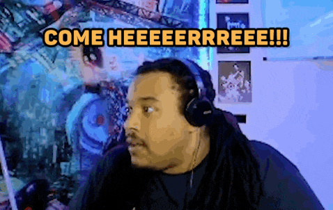 a man wearing headphones says come heeeerrree