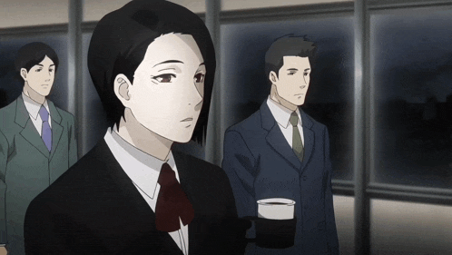a woman in a suit holds a cup of coffee in front of two men in suits