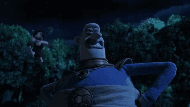 a cartoon character with a soccer ball around his waist is standing in the dark