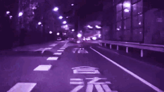 a blurry picture of a street with a red white and blue border